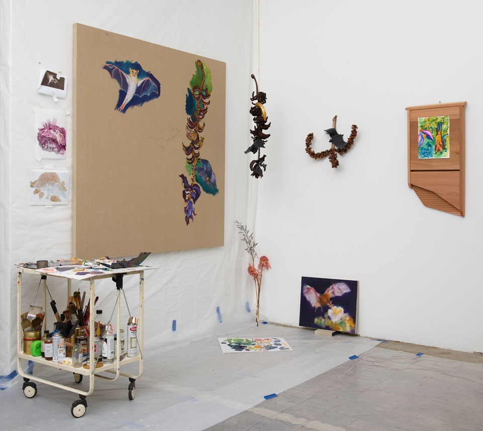 room with bat related artworks